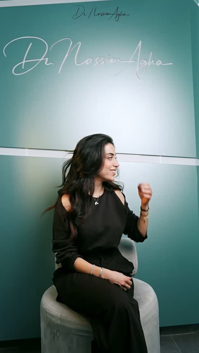 The waiting area, by the wall with his signature